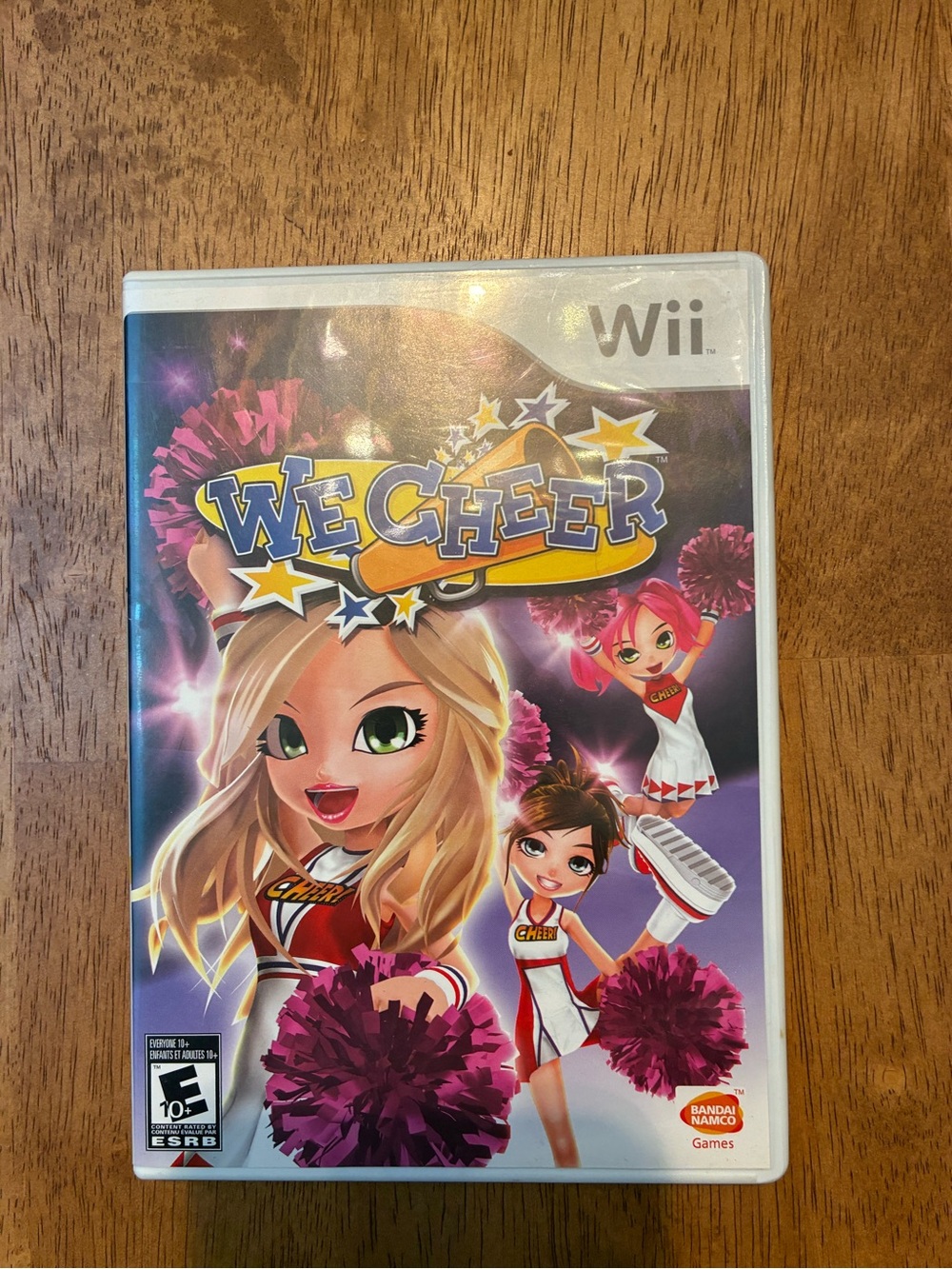 Nintendo Wii We Cheer Video Game with Pink and Purple Artwork